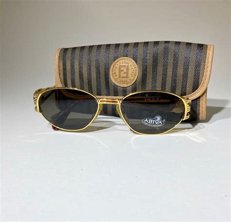 red and gold fendi shades|Gold .